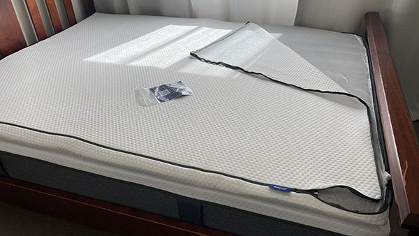 Emma Flip Mattress Topper on a mattress